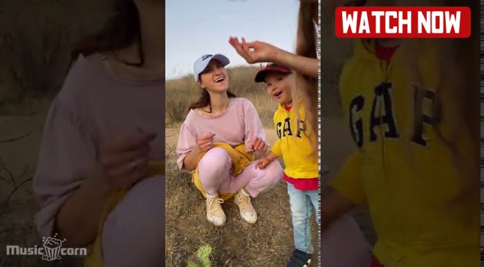 Karolina Protsenko' brother Leo touching a cactus