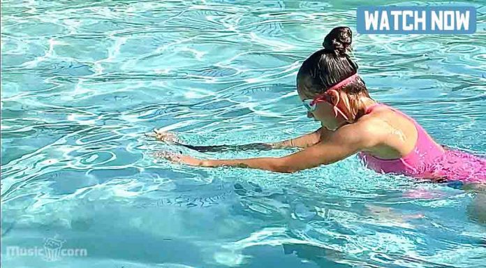 Karolina Protsenko is taking swimming lessons