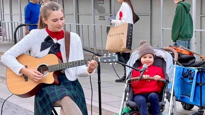 Feliz Navidad - Karolina Protsenko | 3 Year Old Singer in a Stroller